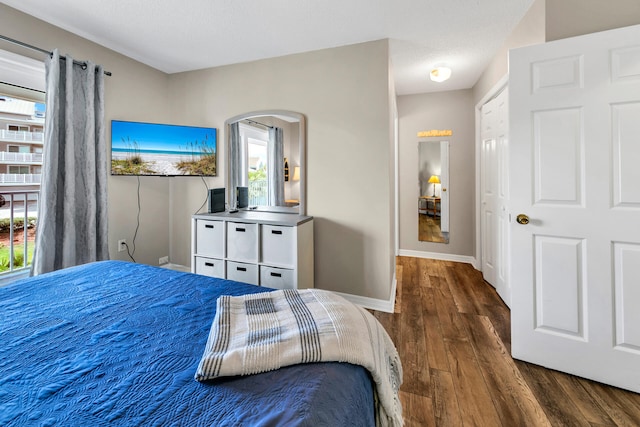 bedroom featuring dark hardwood / wood-style floors