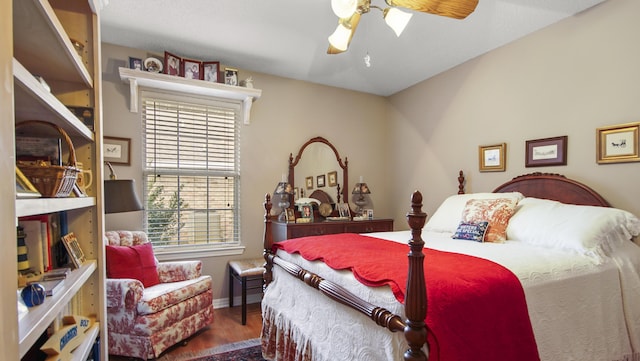 bedroom featuring hardwood / wood-style flooring and ceiling fan