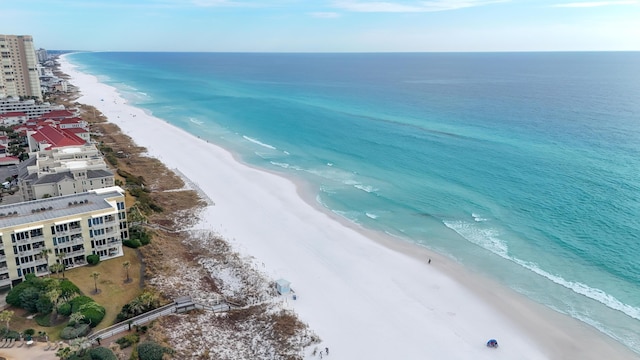 aerial view featuring a view of the beach and a water view