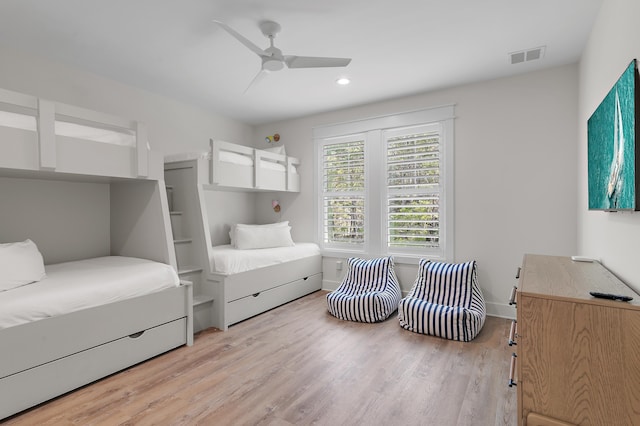 bedroom featuring ceiling fan and light hardwood / wood-style floors