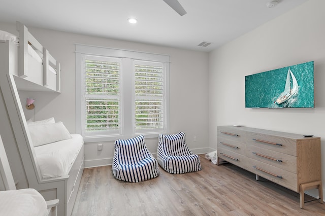 sitting room with light hardwood / wood-style flooring