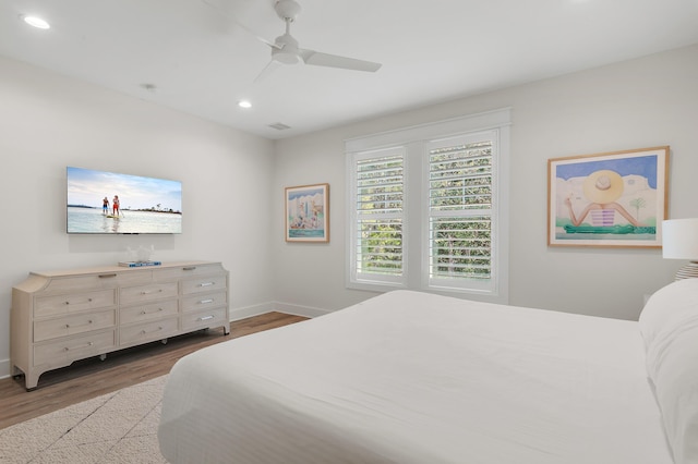 bedroom featuring ceiling fan and light wood-type flooring