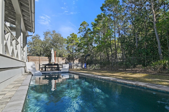 view of pool featuring a patio