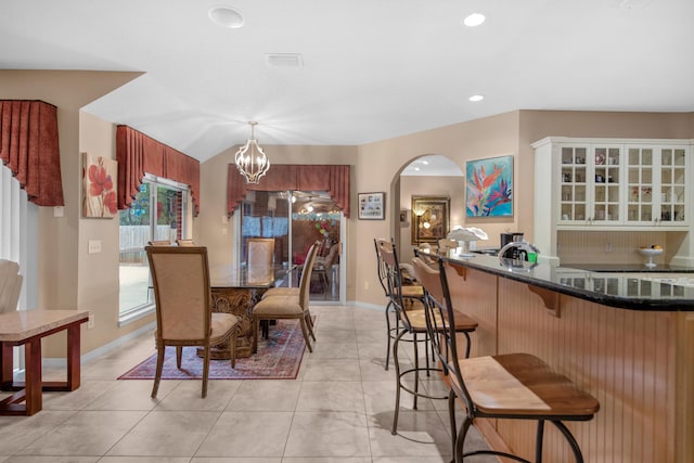 6568 Castlewood St, Navarre, FL 32566 - dining space featuring a notable chandelier