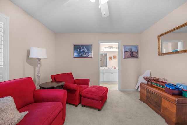 6568 Castlewood St, Navarre, FL 32566 - sitting room featuring light carpet and ceiling fan