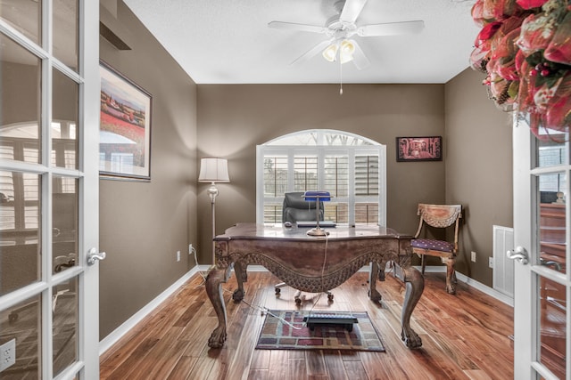 6568 Castlewood St, Navarre, FL 32566 - office with hardwood / wood-style floors, french doors, and ceiling fan