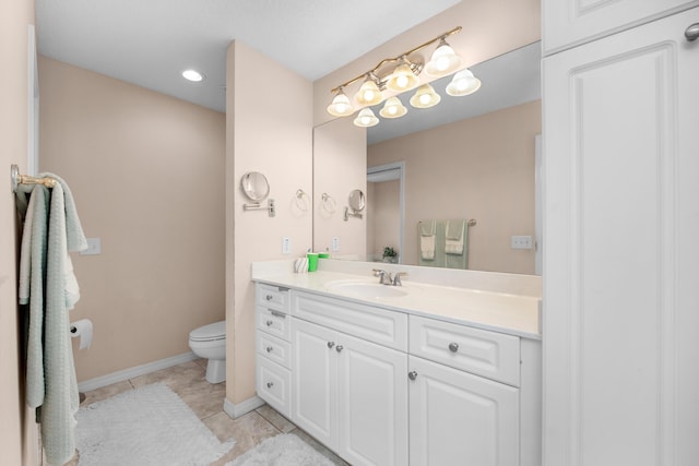 6568 Castlewood St, Navarre, FL 32566 - bathroom with vanity, tile patterned floors, and toilet