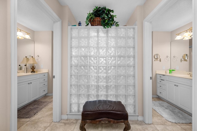 6568 Castlewood St, Navarre, FL 32566 - bathroom with vanity and tile patterned floors