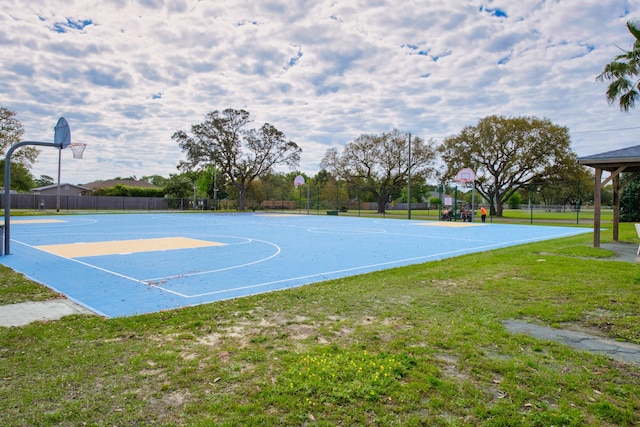 6568 Castlewood St, Navarre, FL 32566 - view of basketball court with a yard