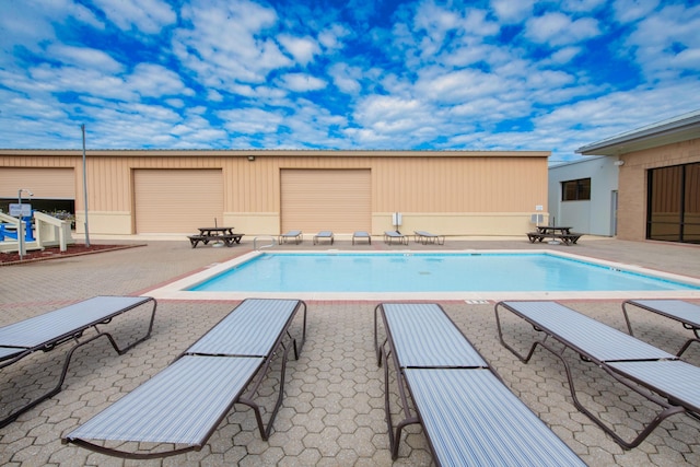 6568 Castlewood St, Navarre, FL 32566 - view of pool featuring a patio