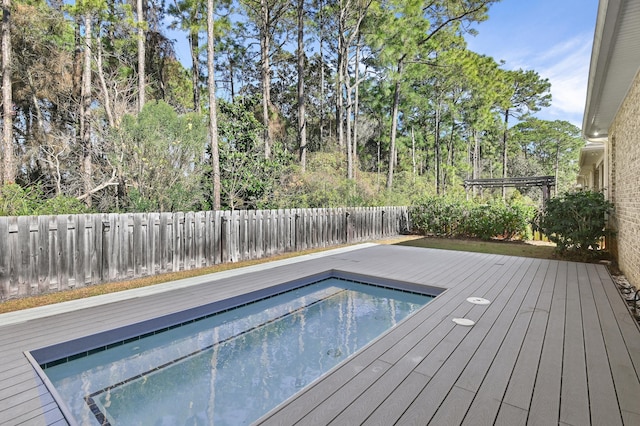 view of pool featuring a wooden deck