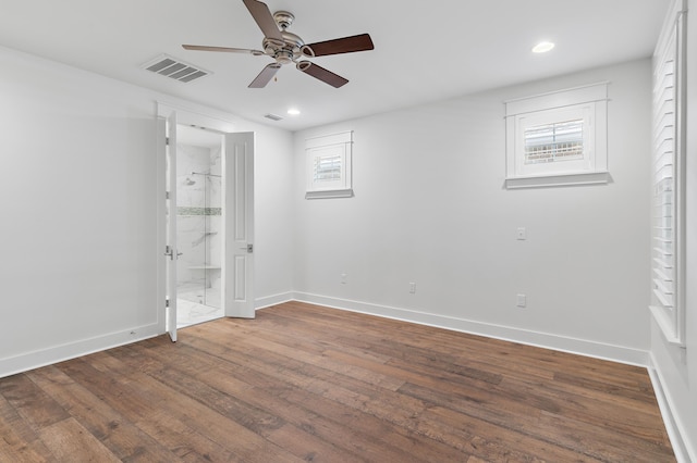 unfurnished room with wood-type flooring and ceiling fan