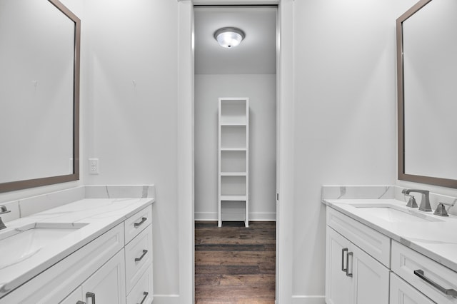 bathroom featuring vanity and hardwood / wood-style floors