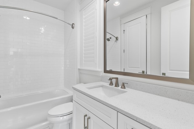 full bathroom featuring vanity, tub / shower combination, and toilet