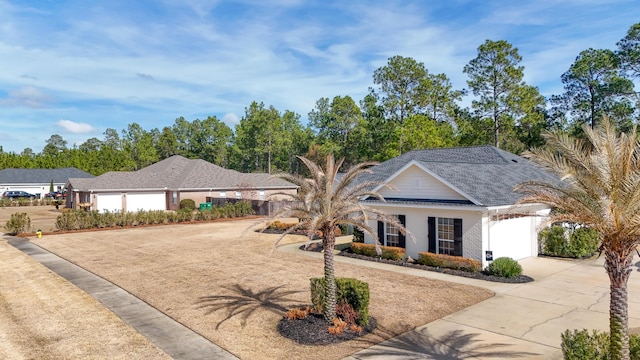 ranch-style house featuring a garage