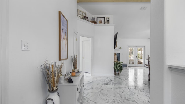 corridor featuring french doors