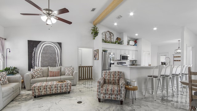 living room with beamed ceiling, ceiling fan, and high vaulted ceiling