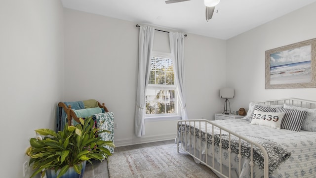 bedroom featuring ceiling fan and wood-type flooring