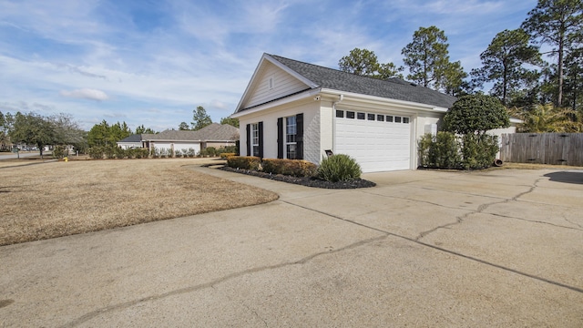 view of side of home with a lawn