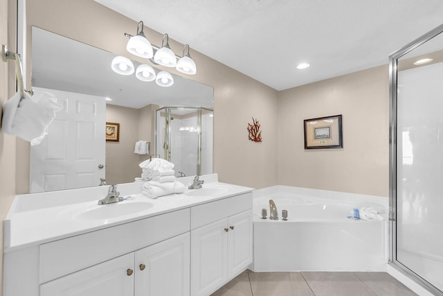 bathroom featuring vanity, tile patterned floors, and independent shower and bath