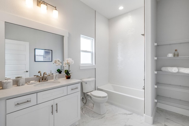 full bathroom with vanity, tub / shower combination, and toilet