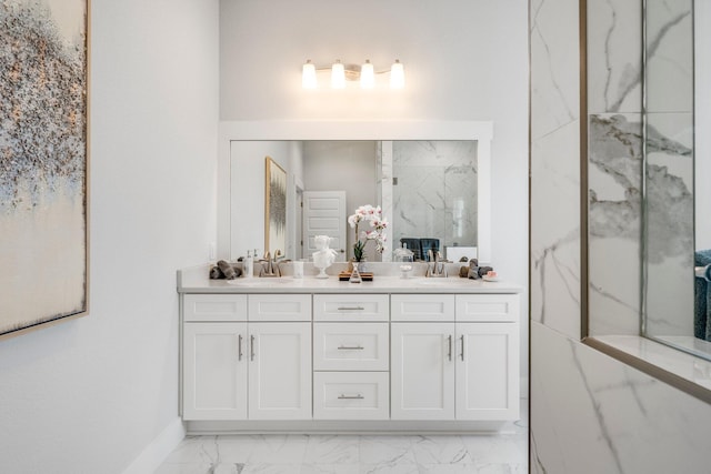 bathroom with walk in shower and vanity