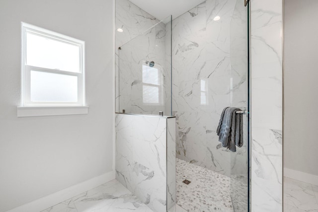 bathroom featuring a tile shower