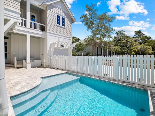 view of pool with a patio