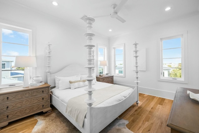 bedroom featuring ceiling fan and light wood-type flooring