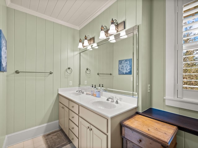 bathroom with ornamental molding, tile patterned flooring, and vanity