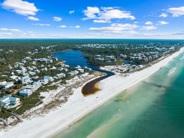 bird's eye view with a water view and a view of the beach