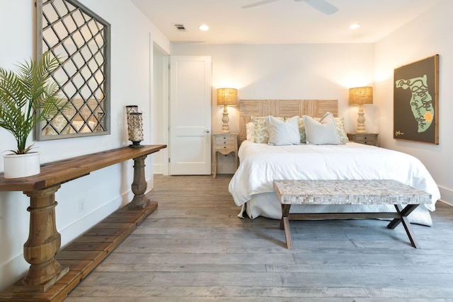 bedroom featuring hardwood / wood-style flooring