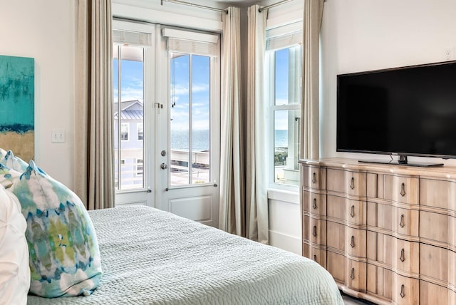 bedroom with access to exterior and french doors