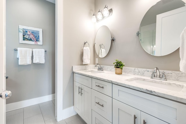 bathroom featuring vanity and tile patterned flooring