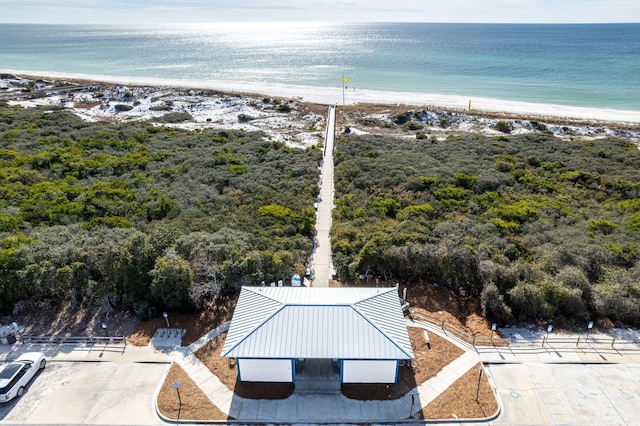 bird's eye view featuring a beach view and a water view