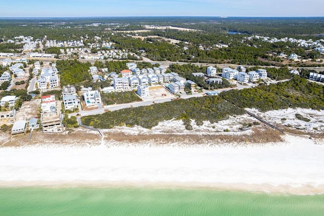 aerial view featuring a beach view and a water view