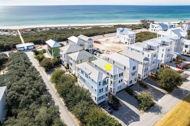 aerial view featuring a water view and a view of the beach