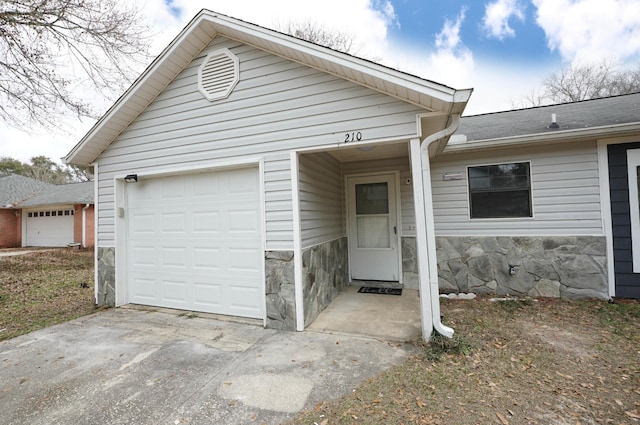 ranch-style home with a garage