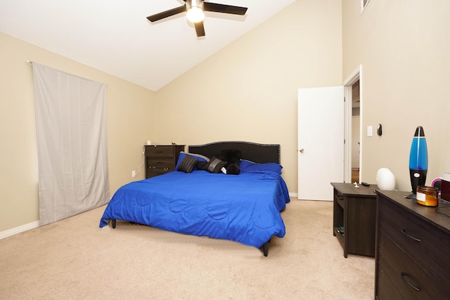 carpeted bedroom with high vaulted ceiling and ceiling fan