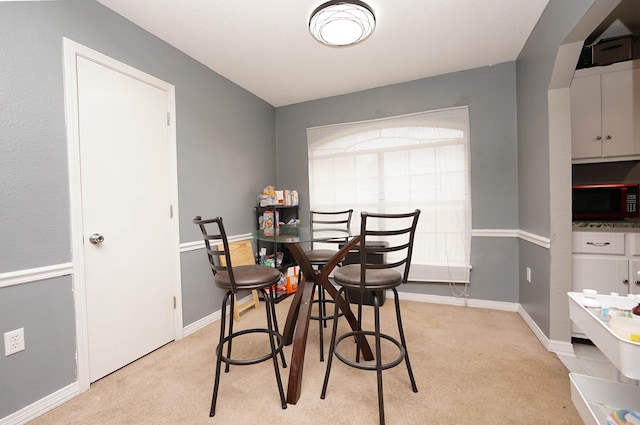 view of carpeted dining room