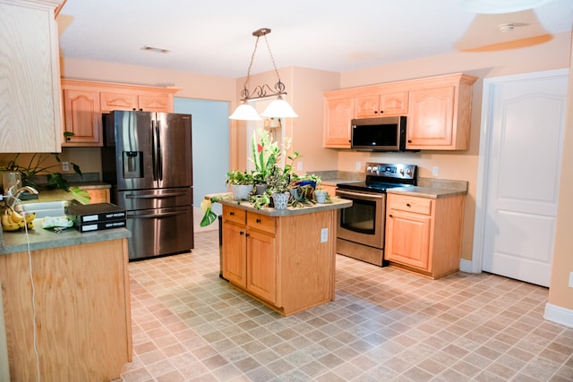 kitchen with light brown cabinetry, sink, a center island, hanging light fixtures, and stainless steel appliances