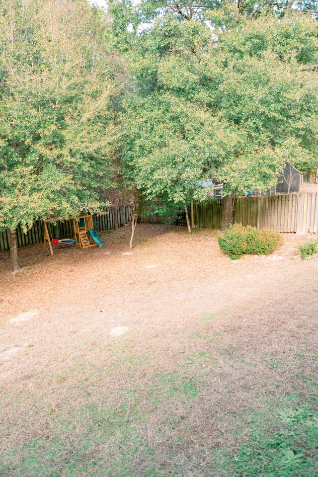 view of yard featuring a playground