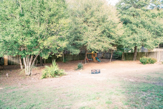 view of yard with a playground