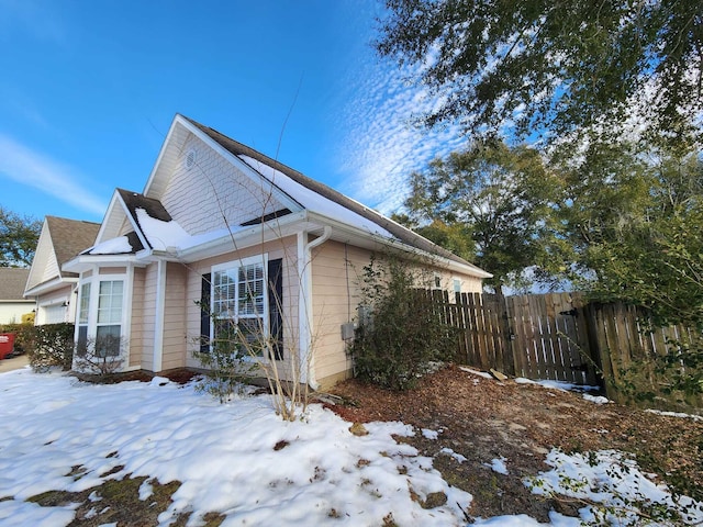 view of snow covered property