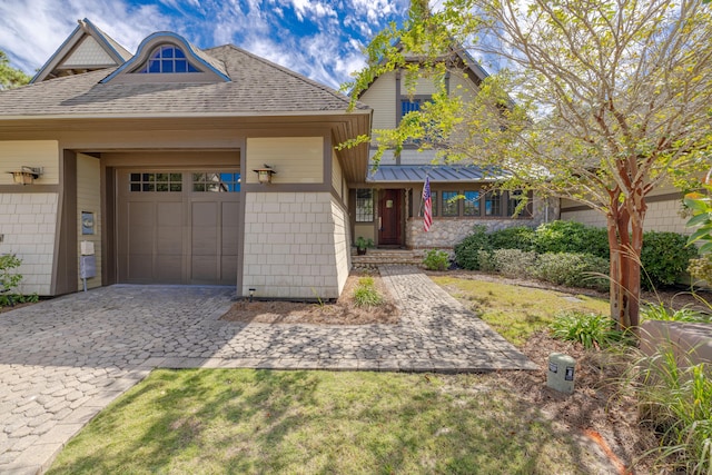 view of front of home with a garage