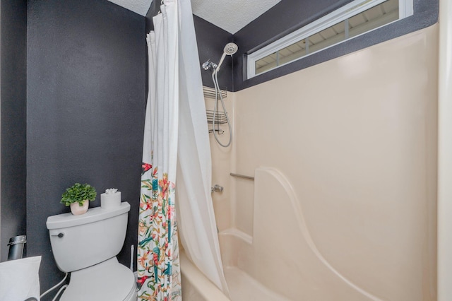 bathroom featuring toilet, shower / tub combo, and a textured ceiling