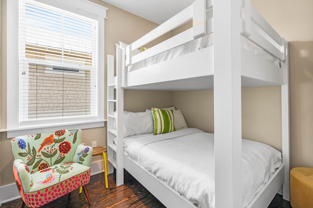 bedroom featuring dark hardwood / wood-style floors