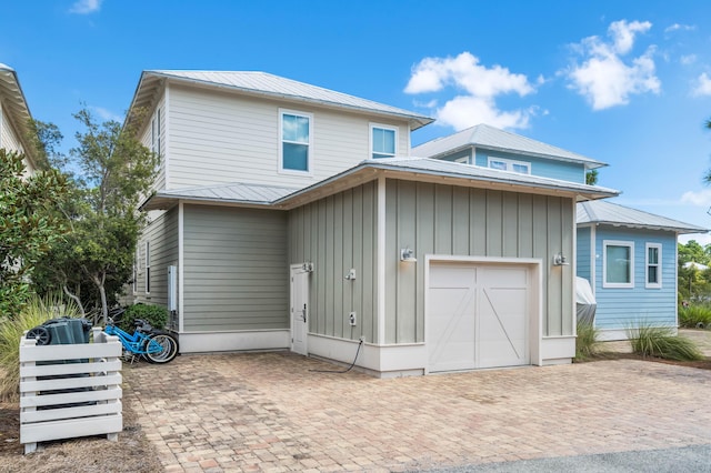 view of front of home with a garage