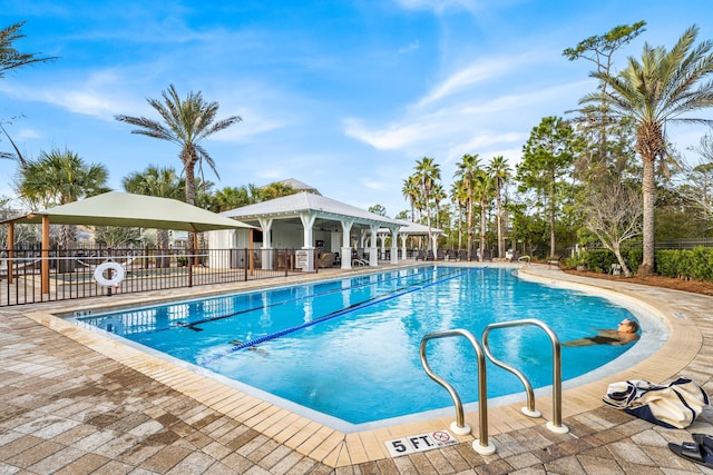 view of pool featuring a gazebo and a patio