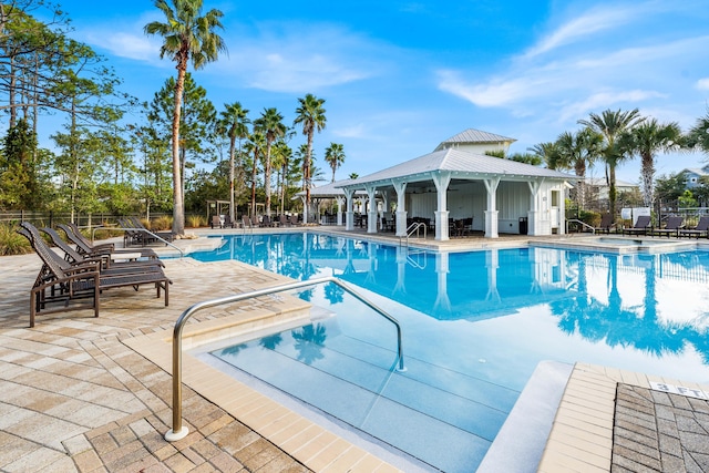 view of swimming pool featuring a patio area